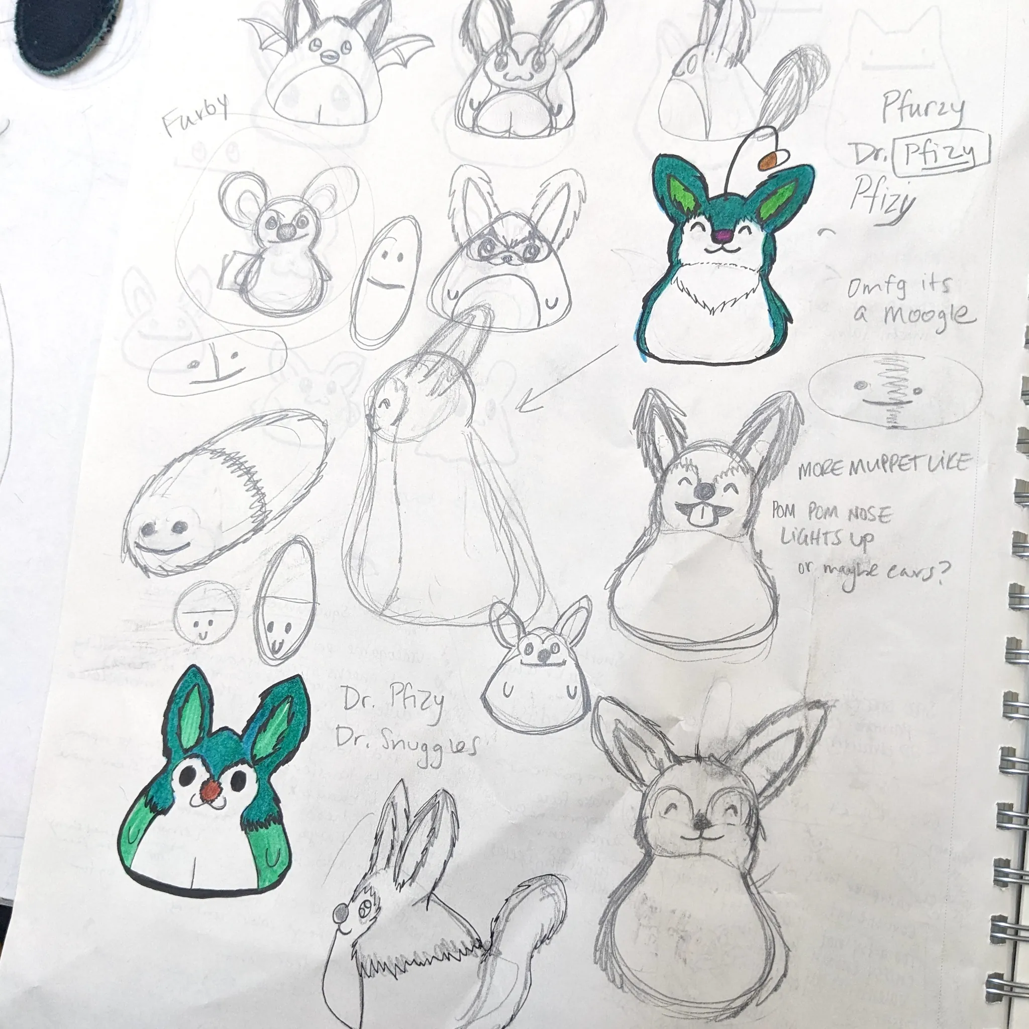 Sketches of a furry character with no arms or legs and with black eyes and long ears