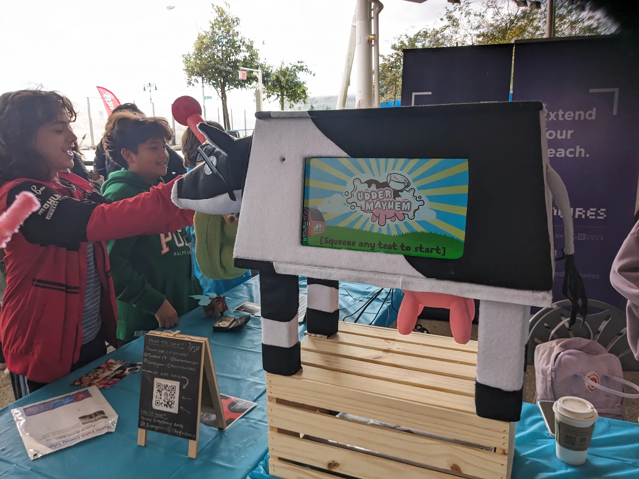A photograph of people setting up at Coney Island Maker Faire