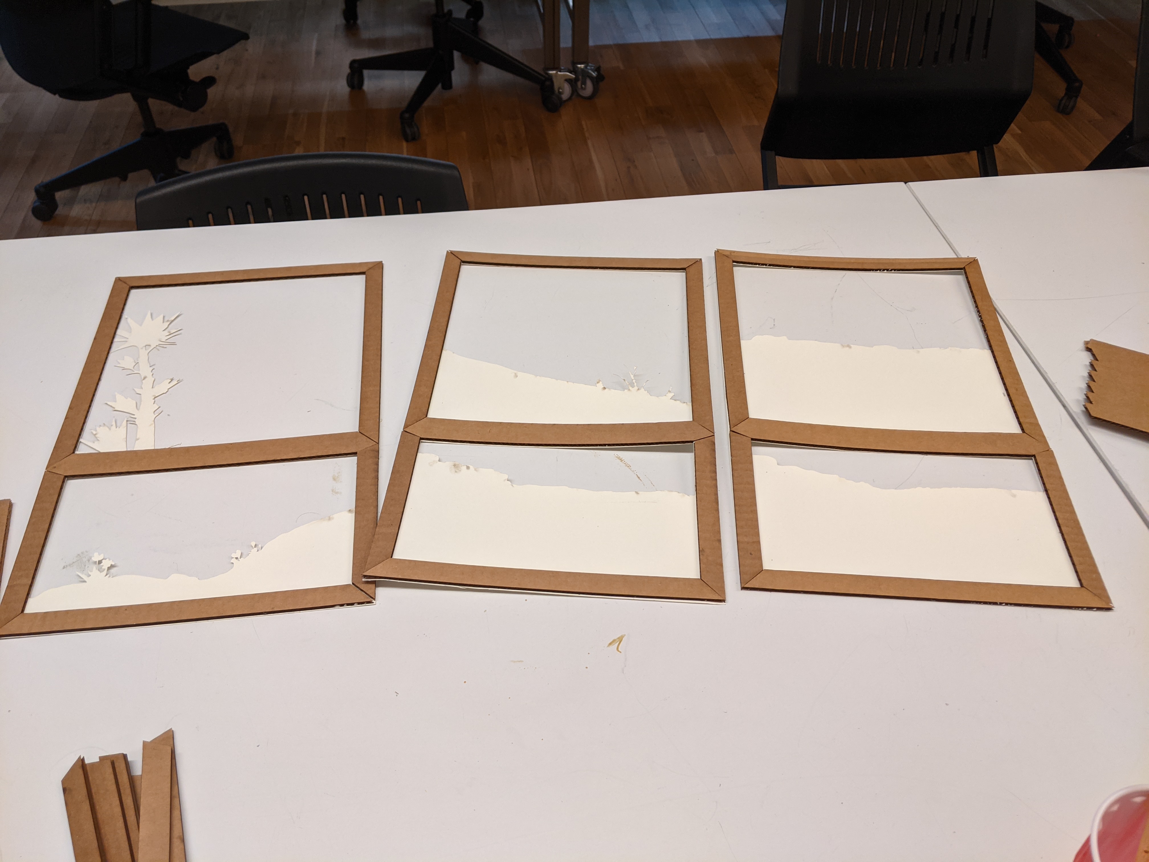 Gluing the cardboard spacers onto the laser cut sheets