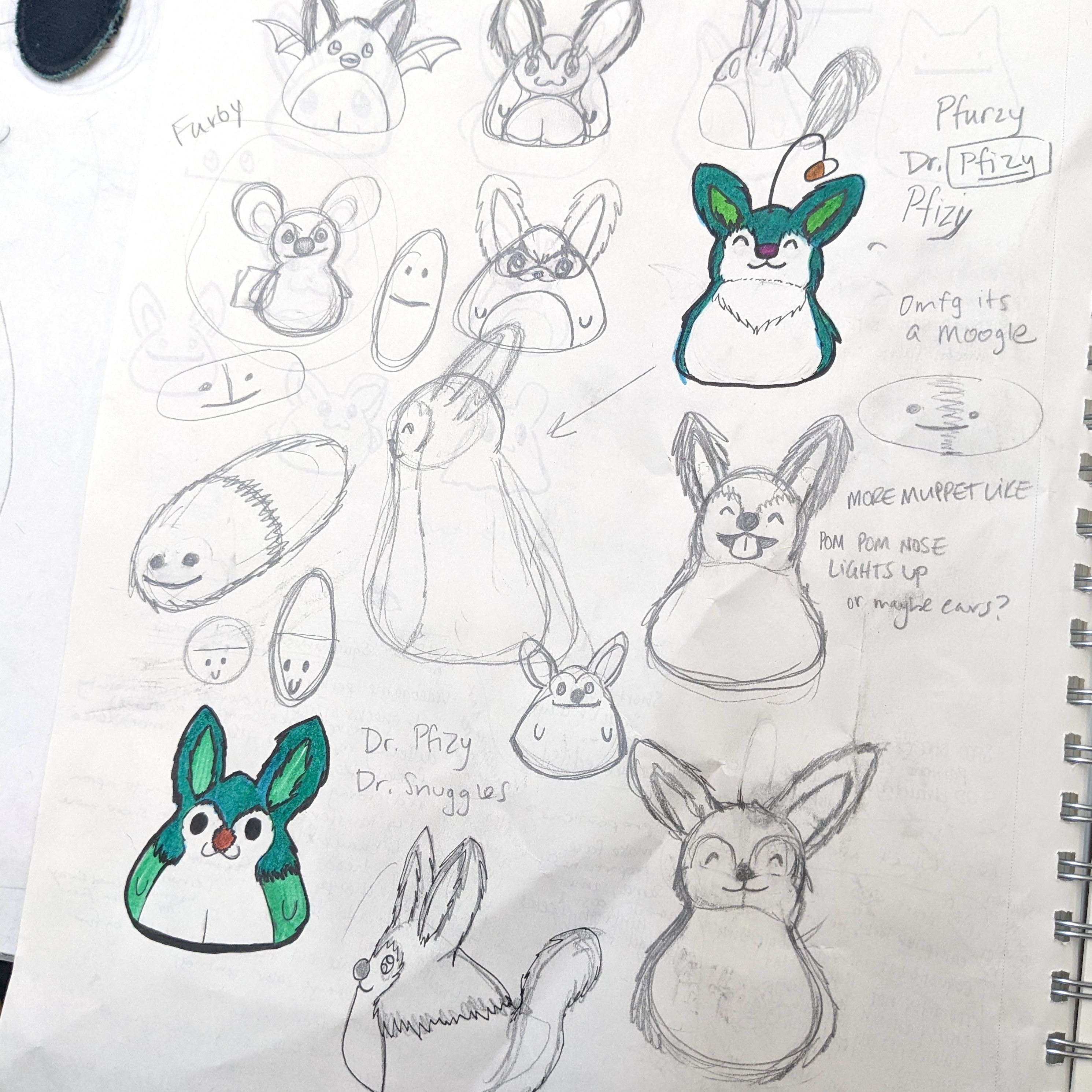 Sketches of a furry character with no arms or legs and with black eyes and long ears