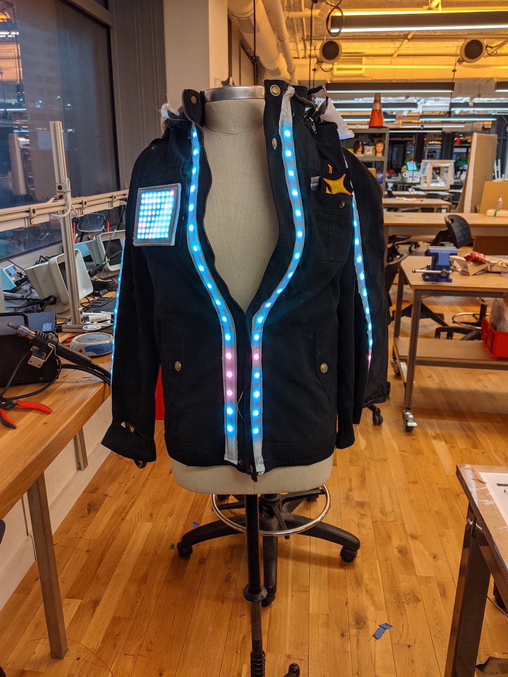 Photograph of a light up jacket on a mannequin